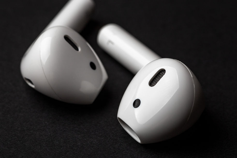 White Bluetooth Earphones_edited.jpg
