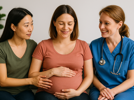 Doula and midwife supporting a pregnant woman.