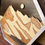 Thumbnail: Closeup for wood mountain wall art showing unique layered design.