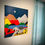Thumbnail: Wood mountain wall art in living room.