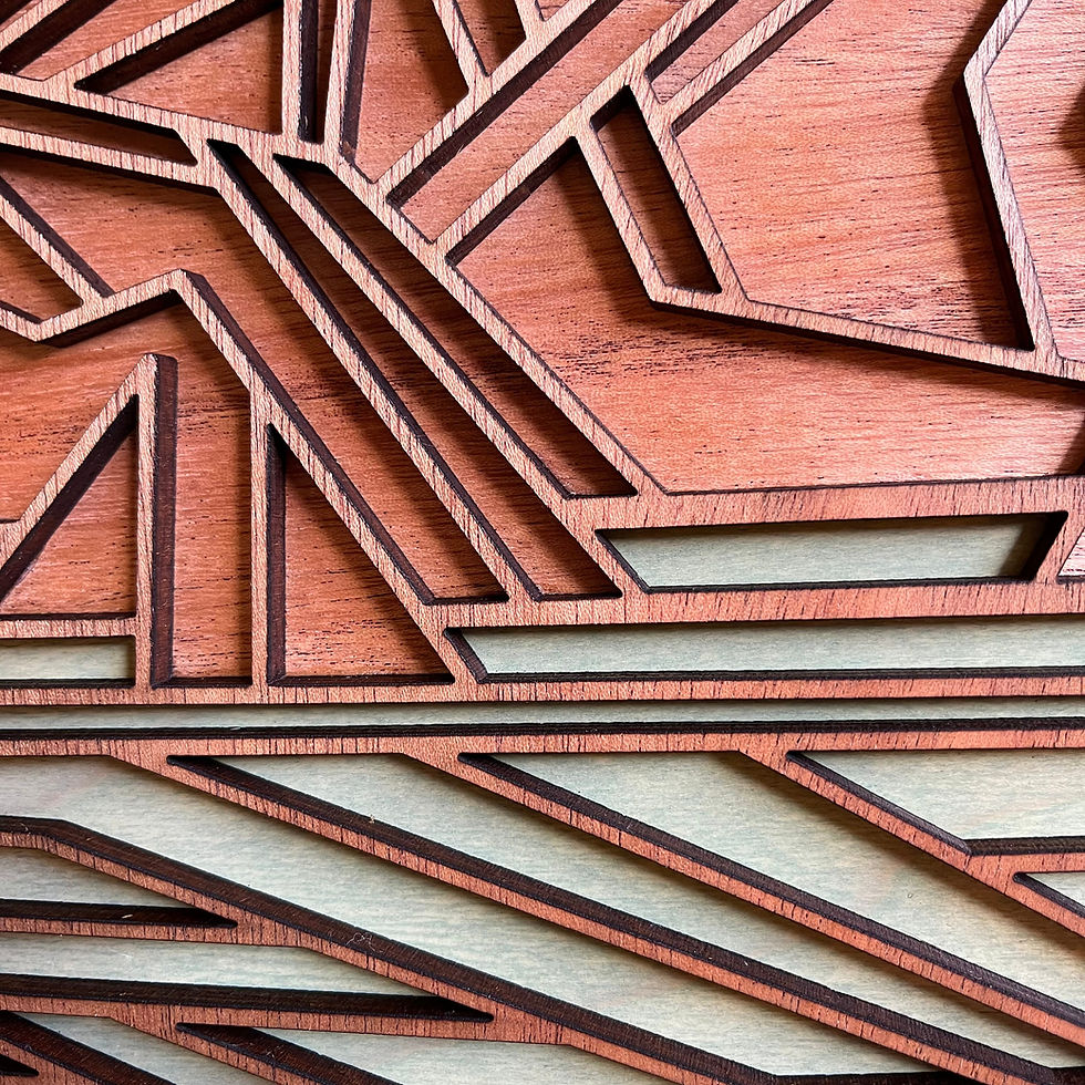 Thumbnail: Closeup of a wooden wall decor piece from Light House Laser Art. Perfect cabin decor.