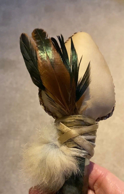 view of shamanic rattle made with deer skin and crystal