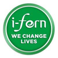 Green circular logo with white text: "i-fern WE CHANGE LIVES." Simple design conveying a positive, transformative message.