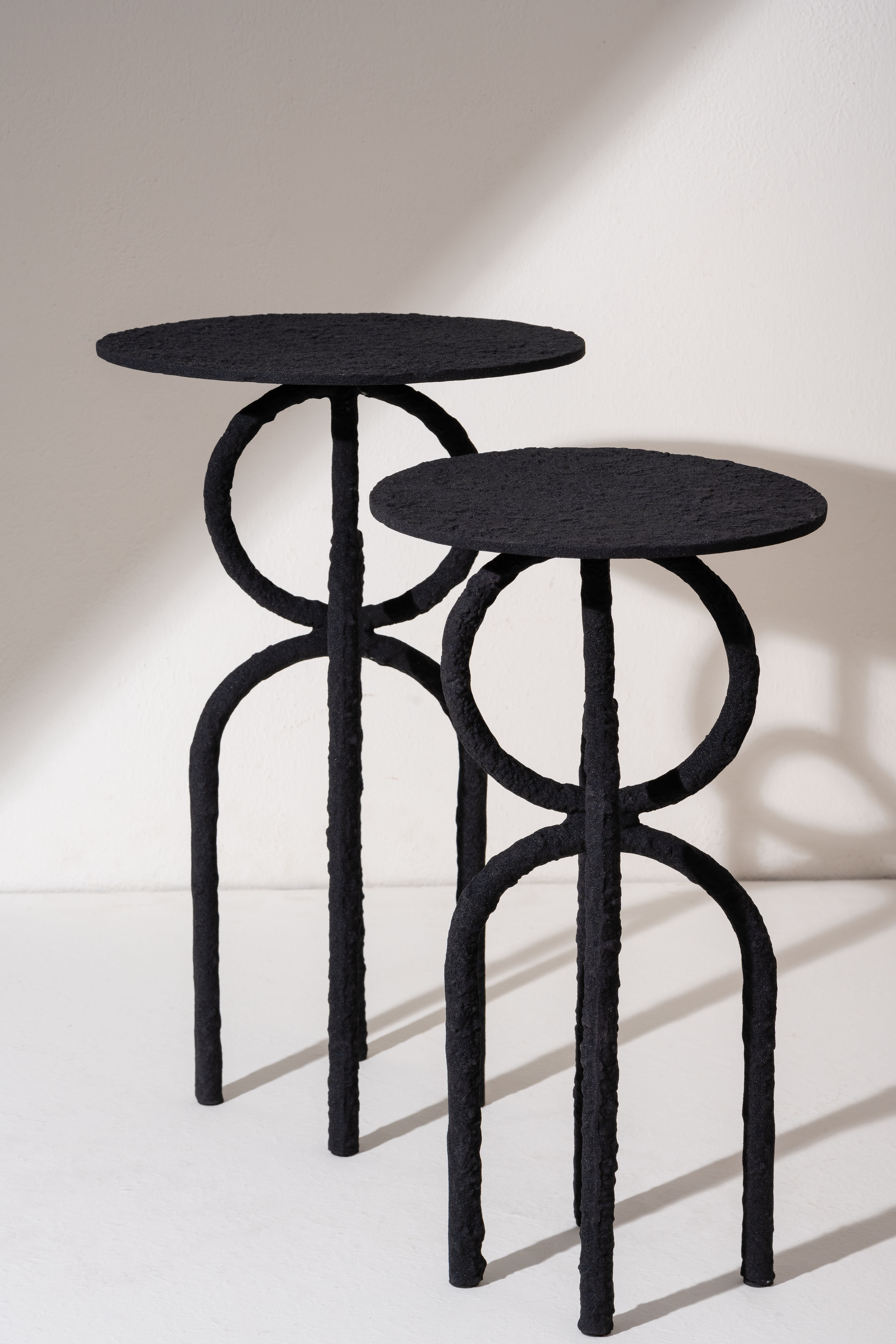 Casted Arc Side Tables