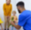 young-multiracial-dentist-playing-with-kids-at-his-2024-10-20-15-14-31-utc.jpg