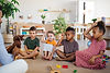 nursery-school-children-with-man-teacher-sitting-o-2024-10-18-08-49-11-utc.jpg