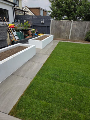 New lawn and rendered walls Benfleet