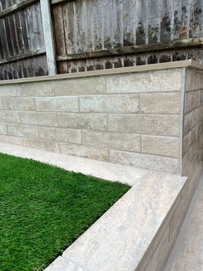 Raised garden wall with artificial grass in Rayleigh Essex