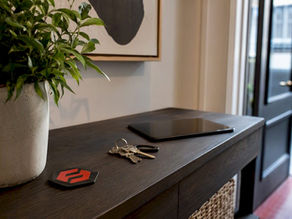 Welcoming keys and tablet on table