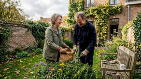 Expat couple cleaning small Belgian backyard