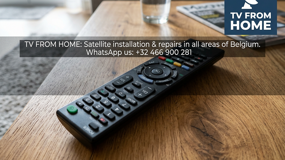 Close-up view of satellite TV remote control on a wooden table