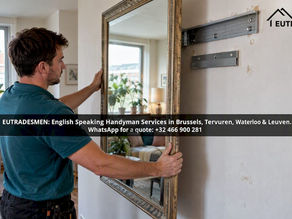 Tradesperson securely mounting a heavy mirror