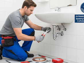 Plumber fixing a wash basin in Leuven.