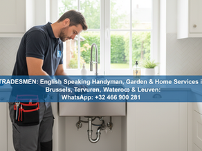 Handyman who speaks English at a clients home in Leuvgen repairing a kitchen sink