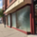 large broken glass in storefront