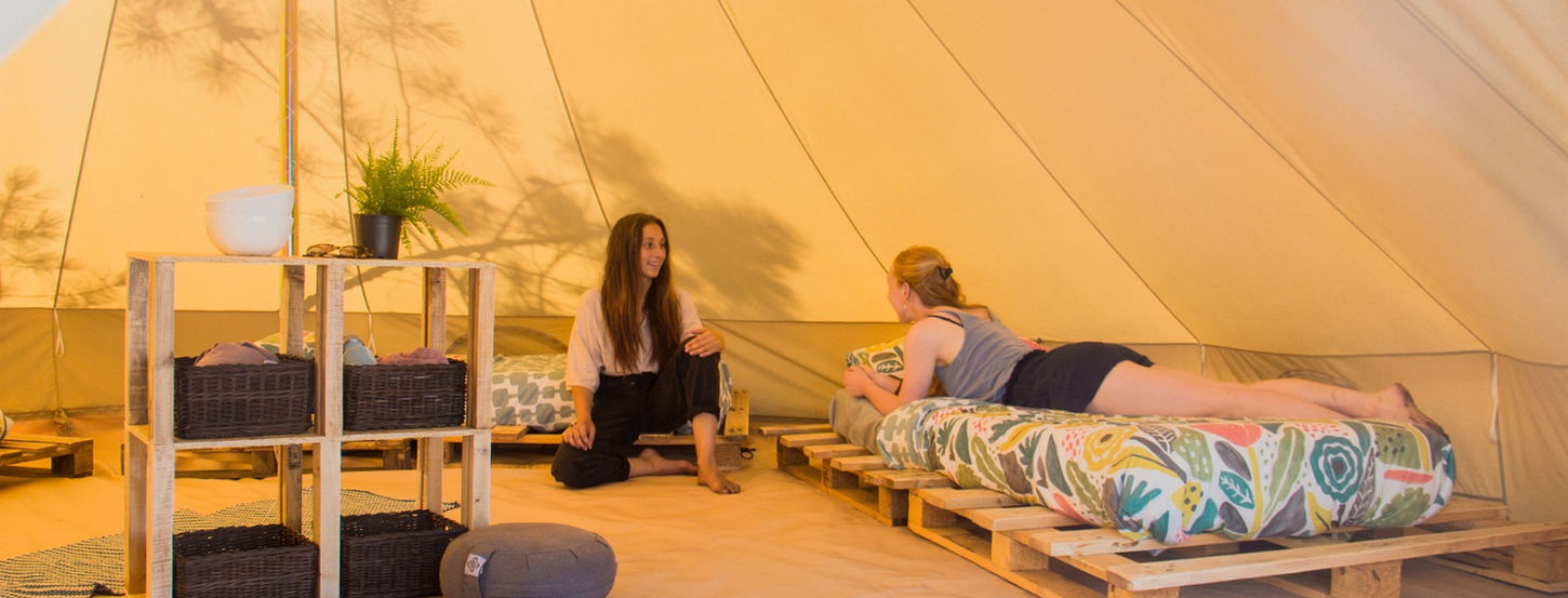 Sea natives surf camp tent two women