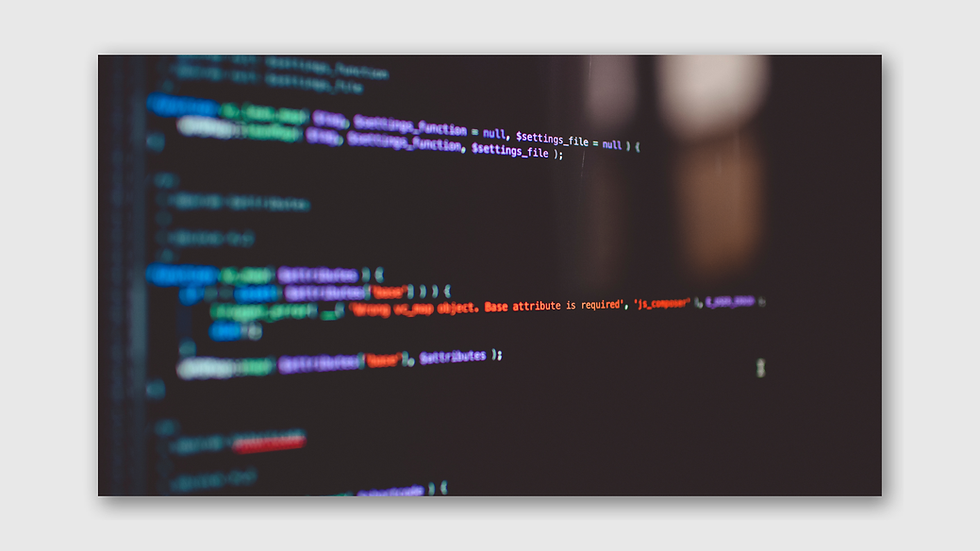Colored code lines on a dark computer screen. The text includes a highlighted error message in red, creating a focused, technical mood.