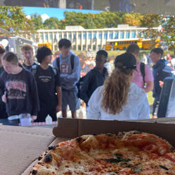 Pizza food truck serving wood-fired pies