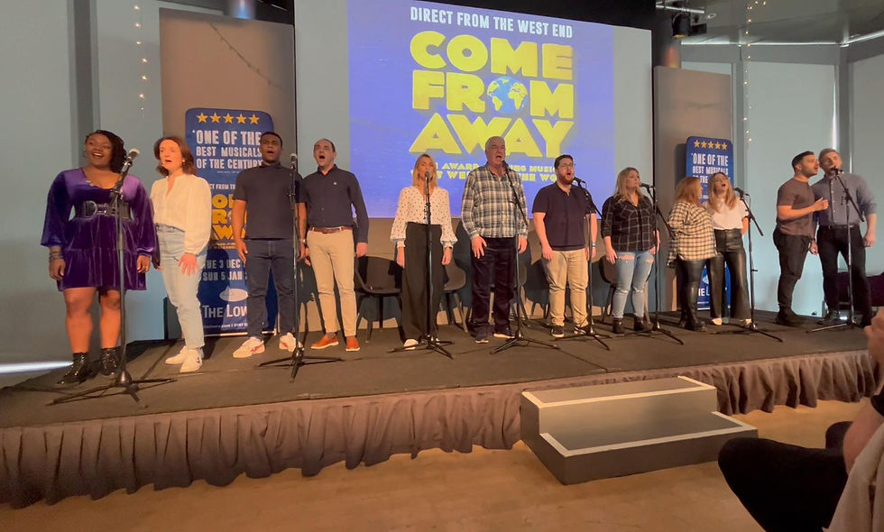 the cast of the uk tour of Come From Away at the come from away Showcase at the Lowry