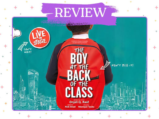 Boy with a red backpack facing away, text "The Boy at the Back of the Class," cityscape and clouds in the teal background, "Live on Stage."