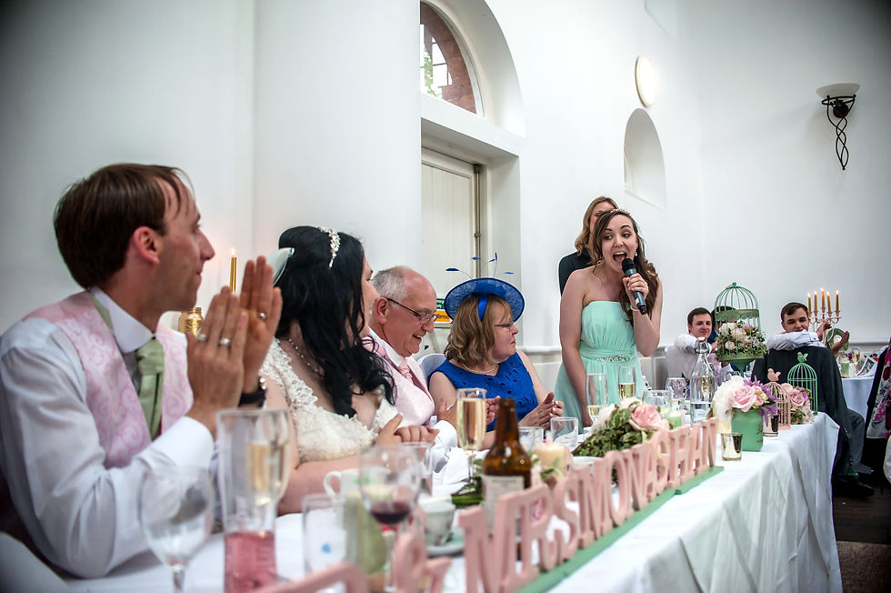 Rachel singing Seasons of Love with the West End Singing Waiters during our wedding breakfast at Chancellors Hotel.