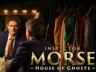 Man in suit sits at a lit vanity mirror with colorful clothes behind him. Text reads "Inspector Morse: House of Ghosts."