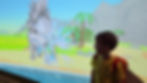 Child in a Pikachu shirt smiles at a digital stegosaurus spraying water, set against a vibrant prehistoric backdrop with palm trees.