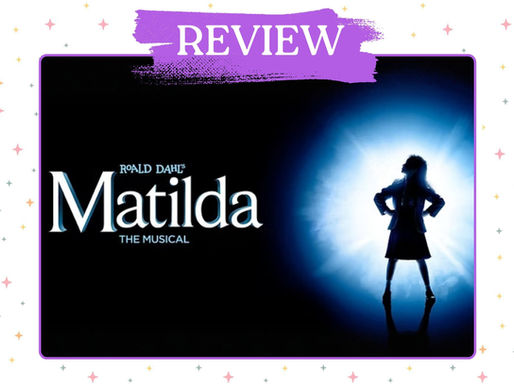 Silhouette of a girl with hands on hips against a blue glowing background. Text reads "Roald Dahl's Matilda The Musical" in white. Mood: empowering.