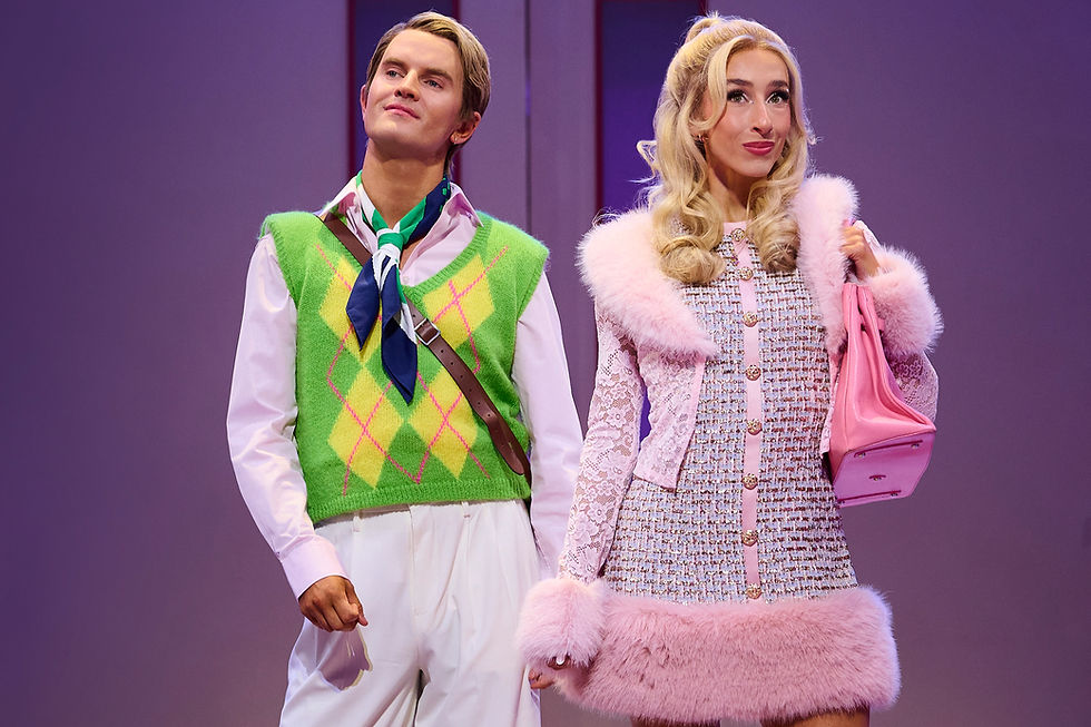 Sharpay Evans wears a pink fur-trimmed outfit alongside Ryan Evans in a green argyle vest in High School Musical at The Lowry.