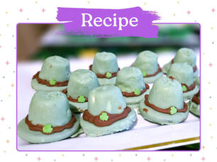 Mint-green, hat-shaped chocolates with brown bands and green clover sprinkles arranged on a tray. "Recipe" text in purple above.