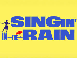 Silhouette of a dancing person with a red umbrella between blue text "Singin' in the Rain" on a bright yellow background.