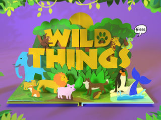 Official Wild Things exhibition artwork featuring Paper-cut jungle scene with WILD THINGS text, colorful animals, and a snake saying Hisss on a purple background.