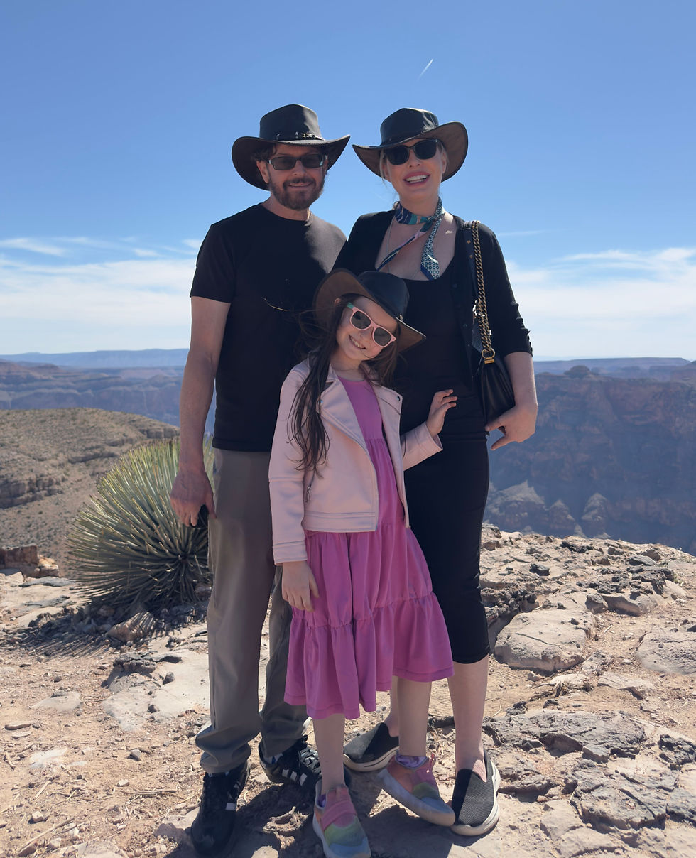 Christianne, Dan, and Livia at Grand Canyon West.  Image by Valarina Jose.