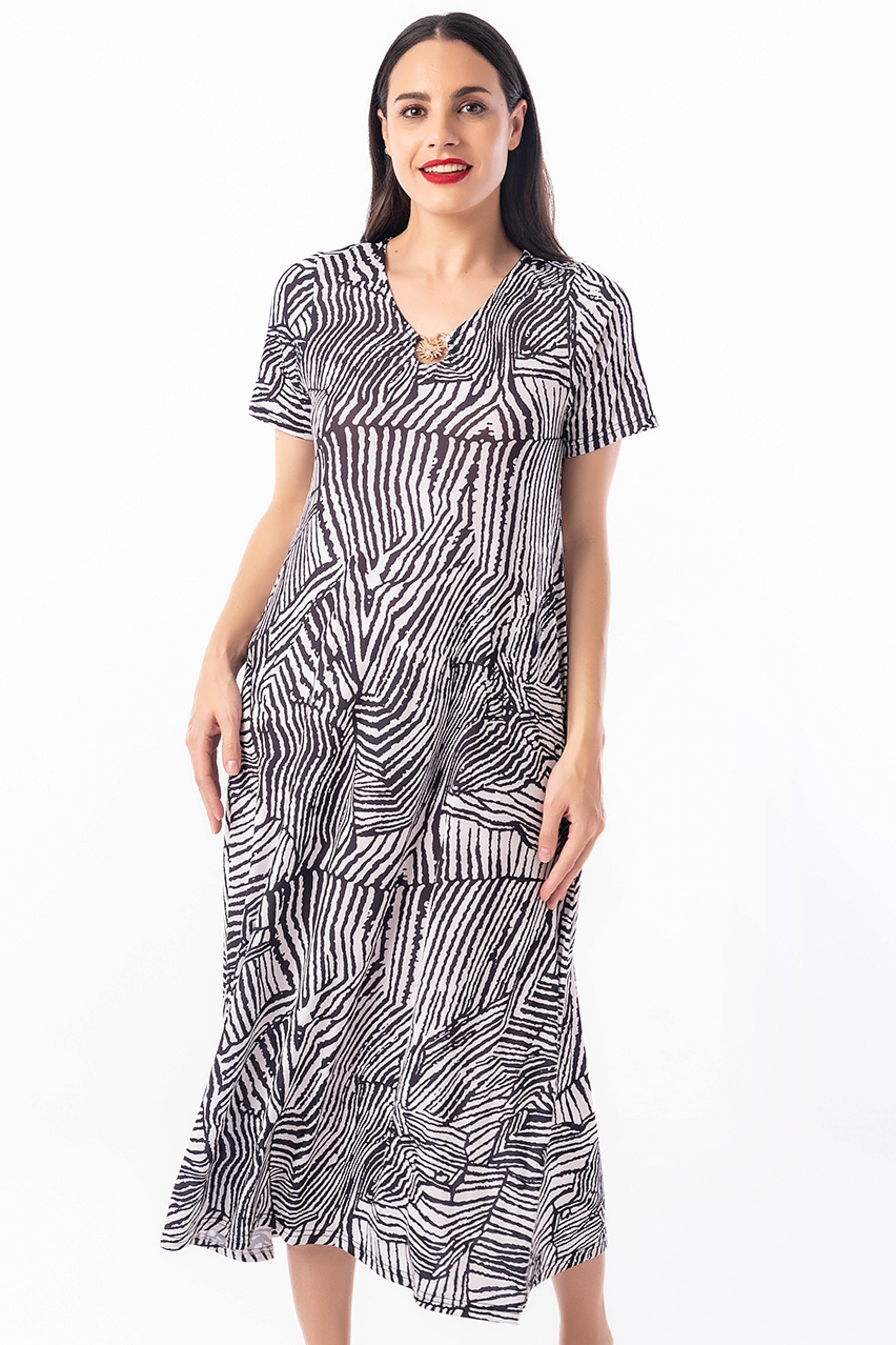 Vestido estampado Midi fluido con escote en pico y detalle central - Genuine