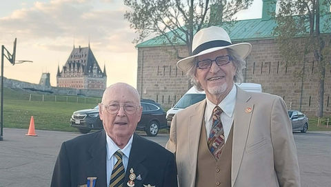 Gustin Keser and Harold Winters, German Veteran, 95 with Chateau Frontenac in the background
