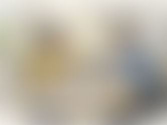 Translators discussing documents at office table