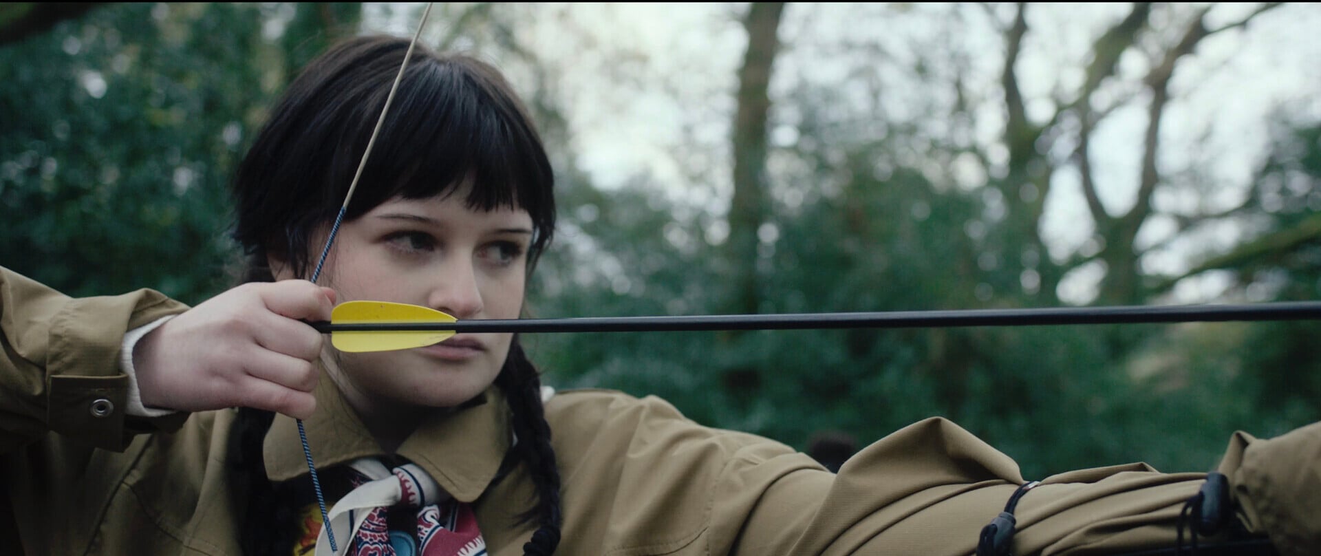 Ratling — Freya aiming a bow at camp