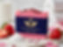 Kiss My Strawberry Body Soap with strawberries and rose petals on display