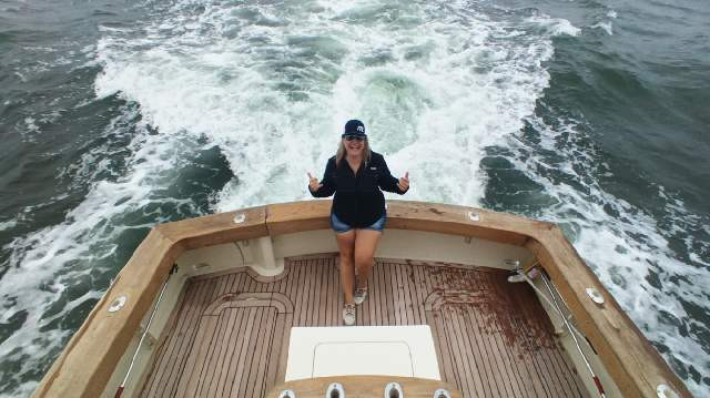 Capt. Deb Deyo astern on the Blue Water Girl