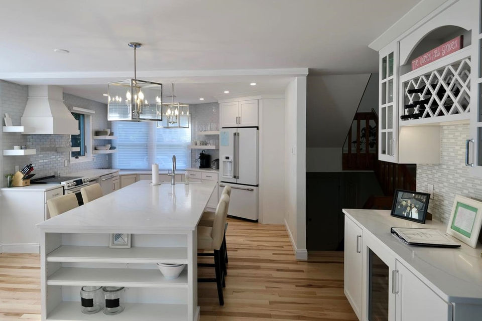 A light and airy chef’s kitchen is part of this extensive condominium renovation by Coastal General Construction in Ogunquit, Maine.