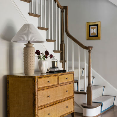 Brenshaw Custom Home Renovation - living spaces renovation featuring new hardwood flooring and new staircase railings