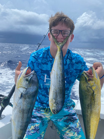 Boy with 3 fish