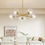 Thumbnail: Modern Gold 5-Light Chandelier With Clear Glass Shades
