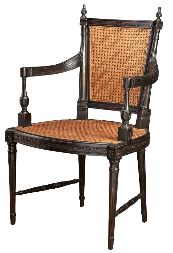 Vintage dark wood cane-back gothic style chair with woven seat, isolated on a black background