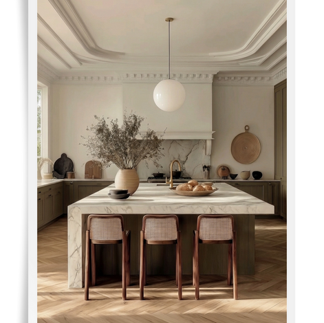 clean modern kitchen with crown moulding, neutral colors and textures, wood parquet flooring and an asymetrical island with barstools, colors are green white and brown, farmhouse meets california coastal luxury kitchen