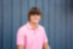 Westerville South senior picture in Uptown Westerville wearing polo