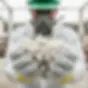Asbestos safety inspection Worker in protective mask and gloves holds asbestos insulation material during a hazardous materials removal and safety check.