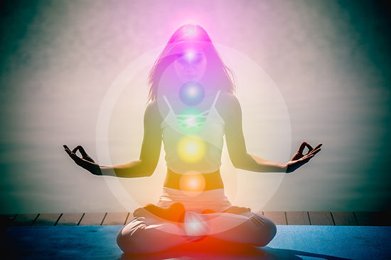 Yoga meditation hands woman in yoga lotus pose with seven chakras, aura, spiritual and Yin