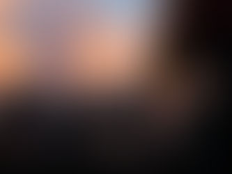 Bus Londonien devant le couché de soleil, photo aprJohan Van Hartlens
