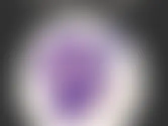 Silhouette of a head in purple puzzle pieces with missing parts, set against a beige background. Text above reads “Alzheimer’s Testing”.